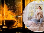 Дівчина гріється біля вікна