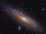 Почему структура галактики Андромеды спиральная? 