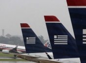 ЕК определила условия для слияния US Airways и American Airlines  