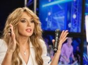 У стадиона "Динамо" сожгли рекламный баннер с кумой Путина