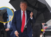 Дональд Трамп з парасолькою