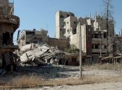 Первый автобус с мирными жителями из Хомса прибыл к пункту сбора 