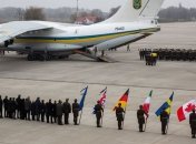 Украина попрощалась с погибшими в авиакатастрофе в Иране: фоторепортаж 