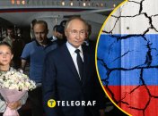 Анна Дульцева та Володимир Путін (зліва направо)