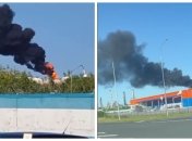 Над заводом поднимается столб дыма