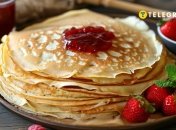 Їх можна подавати з улюбленою начинкою, наприклад, варенням (фото створене з допомогою ШІ)