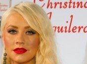 Агилера появится в новом клипе с "грубыми и жестокими парнями"