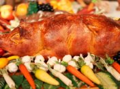 Фаршированный поросенок под гранатовым соусом