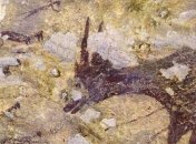 В индонезийской пещере нашли древнейшую картину охоты (Фото)