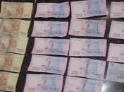 В Днепре полицейский вымогал деньги у несовершеннолетнего