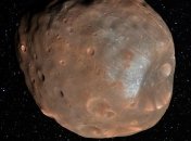 Один из спутников Марса в будущем развалится на части 