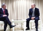Президент МОК Томас Бах и владимир путин в 2019 году