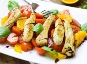 Рецепт дня: курица, запеченная с апельсинами (Видео)