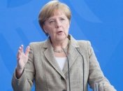 Меркель требует полного выведения войск РФ из Украины