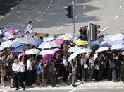 Сингапурцы стоят в очереди, чтобы проститься с Ли Куаном