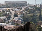 Головная боль Трампа: Жизнь на границе между США и Мексикой (Фото)