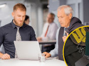 Двоє чоловіків в офісі та військовий квиток