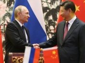 Путин подарил российский смартфон главе КНР