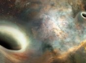 Ученые впервые обнаружили две спаренные черные дыры