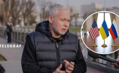 Игорь Терехов и флаги США, Украины, России