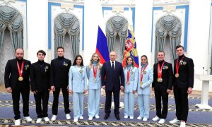 Владимир Путин с российскими олимпийцами
