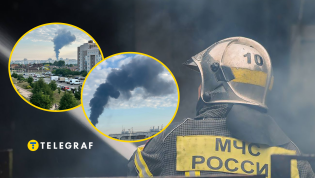 С места атаки поднимается черный дым