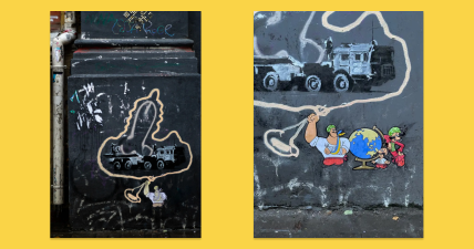 Фото дорисованного граффити Бенкси