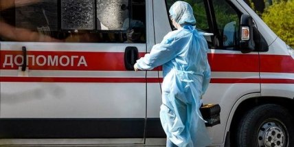 человек в защитном костюме