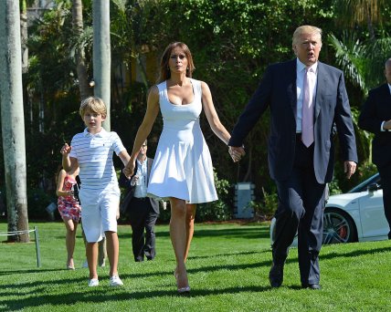Дональд и Мелания Трамп с сыном в 2013 году