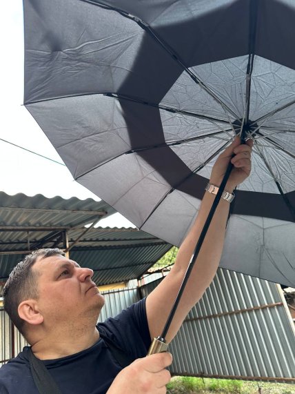 Николай Фокин с зонтиком