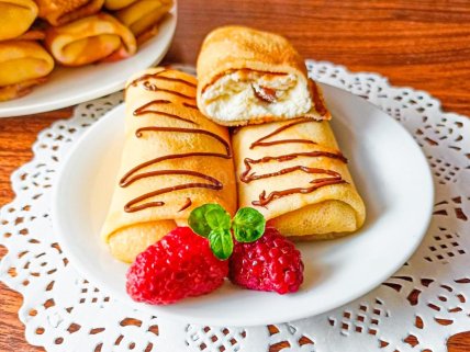 Млинці з сиром та родзинками