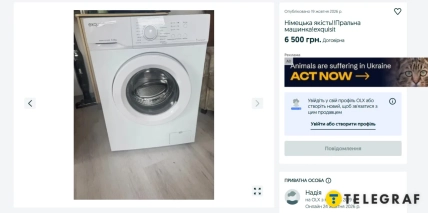 Белая стиральная машина Exquisit с фронтальной загрузкой стоит на полу