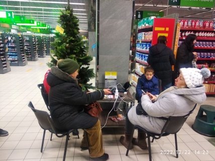 Люди в магазине Novus