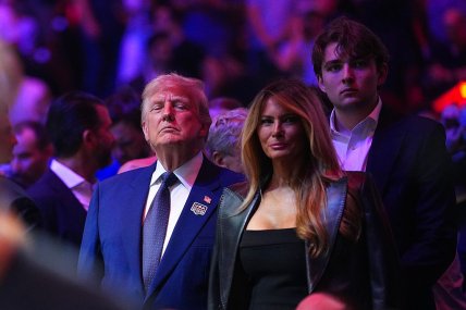 Трамп с сыном Бэрроном и Мелания Трамп