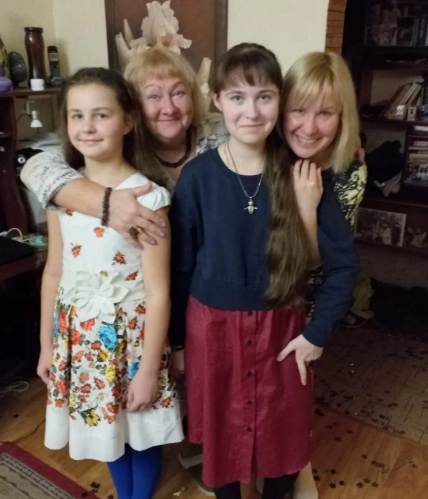 Тетяна Шеліга з донькою та онуками
