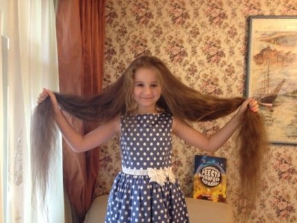 Восьмилетняя украинка установила рекорд по длине волос (ФОТО) - изображение №1