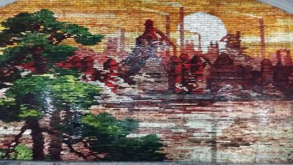 Фрески біля входу в метро у Північній Кореї