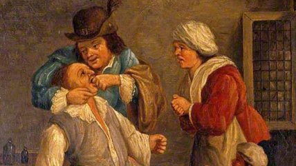 цирюльник вырывает зубы