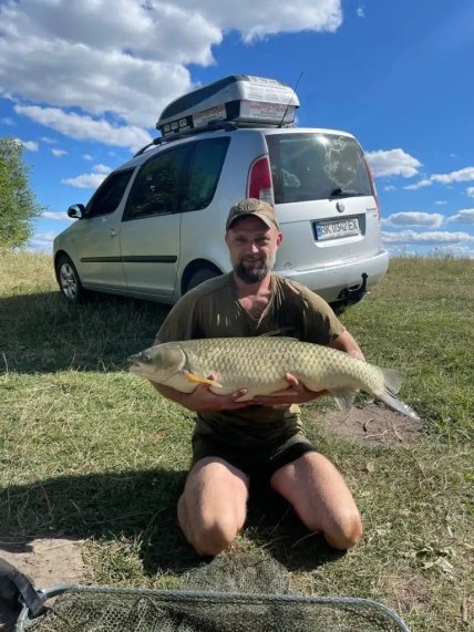 Муж выловил белого амура