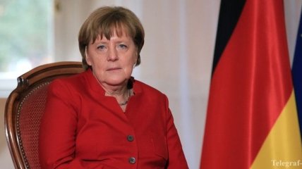 Меркель обещает РФ немедленную отмену санкций за выполнение Минских соглашений