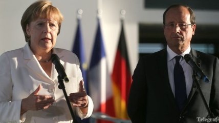 Меркель и Олланд одобряют принятие резолюции по Сирии