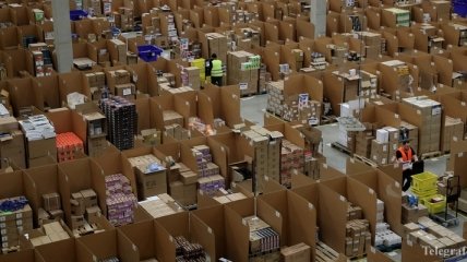 Amazon создал для сотрудников жилеты, помогающие избежать столкновений с роботами