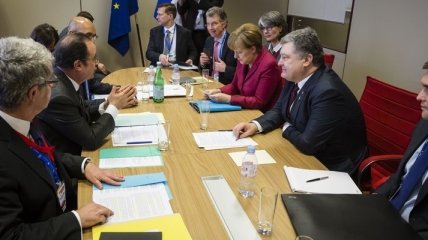 Меркель и Олланд: Санкции против РФ сохранятся до выполнения "Минска-2"