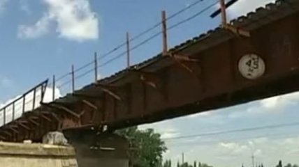Восстановлен мост, взорванный террористами в Запорожской области