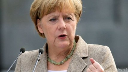 Меркель: Переговоры в Минске способствуют разрешению кризиса