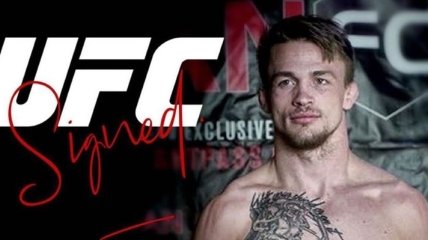 Скандал в UFC: боец отказался продолжать бой между раундами, а секундант не сдавался (Видео)