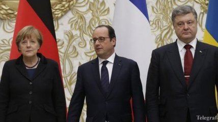 Олланд, Меркель и Порошенко обсудили по телефону выполнение Минских соглашений