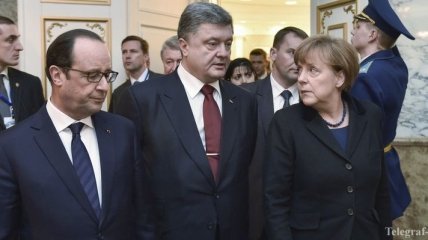 Олланд, Меркель и Порошенко выразили обеспокоенность боями в Дебальцево