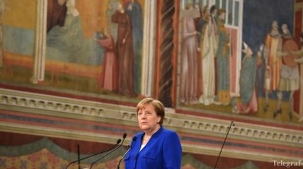Меркель в ходе визита в Италию говорила о Донбассе