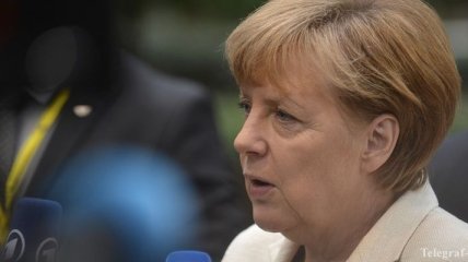 Меркель пообещала Украине содействие в финансовых вопросах